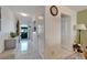 Bright and spacious entryway with tile flooring and coat rack at 5286 81St N St # 4, St Petersburg, FL 33709