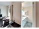 A well-lit bathroom with a light blue vanity and shower at 5286 81St N St # 4, St Petersburg, FL 33709