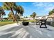 Relaxing outdoor patio area with fire pit and benches at 5286 81St N St # 4, St Petersburg, FL 33709