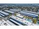 Aerial view of condo community with multiple buildings, parking, and landscaping at 5286 81St N St # 4, St Petersburg, FL 33709