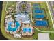 Aerial view of community pool, tennis courts, playground, and clubhouse at 6269 Camino Dr, Apollo Beach, FL 33572