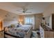 Main bedroom with a king-size bed and coastal decor at 3507 59Th W Ave # 4020, Bradenton, FL 34210