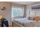 Bright bedroom with a king-size bed and coastal decor at 3507 59Th W Ave # 4020, Bradenton, FL 34210