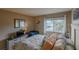 Bedroom with king-size bed, coastal decor, and a dresser at 3507 59Th W Ave # 4020, Bradenton, FL 34210