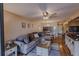 Open living area with sectional sofa and wood floors at 3507 59Th W Ave # 4020, Bradenton, FL 34210