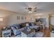 Living area featuring a sectional sofa and wood floors at 3507 59Th W Ave # 4020, Bradenton, FL 34210