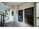 Interior hallway view with condo unit doors at 2650 Countryside Blvd # F110, Clearwater, FL 33761