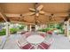 Relaxing community pavilion with tables and ceiling fans at 2650 Countryside Blvd # F110, Clearwater, FL 33761