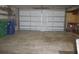 Attached garage with ample space for storage and workshop at 10213 Newport Cir, Tampa, FL 33612