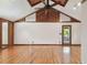 Living room features high ceilings, wood floors, and a ceiling fan at 10213 Newport Cir, Tampa, FL 33612