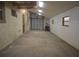 Workshop with concrete floor, garage door access, and various tools at 10213 Newport Cir, Tampa, FL 33612