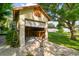 Detached workshop with storage shelving and workbench at 10213 Newport Cir, Tampa, FL 33612