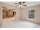 Dining area with tile flooring and views to kitchen and living room at 655 Appaloosa Rd, Tarpon Springs, FL 34688