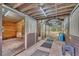 Bright barn aisle with multiple stalls and mats at 655 Appaloosa Rd, Tarpon Springs, FL 34688