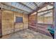 Empty stall with wood walls and a window at 655 Appaloosa Rd, Tarpon Springs, FL 34688