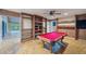 Game room featuring a pool table and built-in wooden shelving at 655 Appaloosa Rd, Tarpon Springs, FL 34688