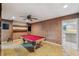 Game room with a pool table and corkboard walls at 655 Appaloosa Rd, Tarpon Springs, FL 34688