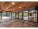 Covered patio overlooking the pool and backyard at 655 Appaloosa Rd, Tarpon Springs, FL 34688