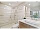 Clean bathroom with walk-in shower, toilet and modern vanity at 777 N Ashley Dr # 806, Tampa, FL 33602