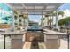 Outdoor kitchen with granite countertop and stainless steel grill at 777 N Ashley Dr # 806, Tampa, FL 33602