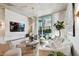 Modern living room with marble fireplace and large windows at 777 N Ashley Dr # 806, Tampa, FL 33602