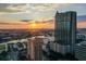 Stunning aerial view of the highrise building and surrounding cityscape at sunset at 777 N Ashley Dr # 806, Tampa, FL 33602