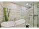 Bathroom with soaking tub, walk-in shower, and modern fixtures at 777 N Ashley Dr # 806, Tampa, FL 33602