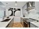 Modern kitchen with stainless steel appliances and marble countertops at 777 N Ashley Dr # 806, Tampa, FL 33602