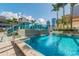 Refreshing rooftop pool with city views and palm trees at 777 N Ashley Dr # 806, Tampa, FL 33602