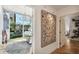 Bright hallway with herringbone floors, leading to living spaces and bedrooms at 777 N Ashley Dr # 806, Tampa, FL 33602