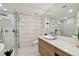 Spa-like bathroom with walk-in shower, soaking tub, and modern vanity at 777 N Ashley Dr # 806, Tampa, FL 33602