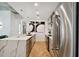 Modern kitchen with stainless steel appliances and marble countertops at 777 N Ashley Dr # 806, Tampa, FL 33602