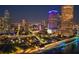 Night view of Tampa's skyline and the waterfront, showcasing city lights at 777 N Ashley Dr # 806, Tampa, FL 33602