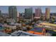 Aerial view of Downtown Tampa, FL at dusk, showcasing the city skyline and waterfront at 777 N Ashley Dr # 806, Tampa, FL 33602