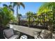 Private patio with seating area and lush tropical landscaping at 777 N Ashley Dr # 806, Tampa, FL 33602