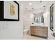 Contemporary powder room with floating vanity and modern art at 777 N Ashley Dr # 806, Tampa, FL 33602