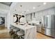 Modern kitchen with marble island and stainless steel appliances at 777 N Ashley Dr # 806, Tampa, FL 33602