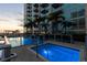 Relaxing hot tub on the rooftop with city views at sunset at 777 N Ashley Dr # 806, Tampa, FL 33602