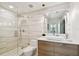 Clean bathroom with walk-in shower and modern floating vanity at 777 N Ashley Dr # 806, Tampa, FL 33602