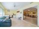 Sunroom boasts tiled floors and a view into the living area at 2535 Lancaster Dr # 2535, Sun City Center, FL 33573