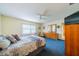 Spacious bedroom with a king-size bed and plenty of closet space at 2535 Lancaster Dr # 2535, Sun City Center, FL 33573