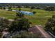 Aerial view of house and surrounding golf course at 2535 Lancaster Dr # 2535, Sun City Center, FL 33573