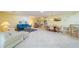 Bright living room with tile floors and comfortable seating at 2535 Lancaster Dr # 2535, Sun City Center, FL 33573