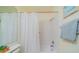 Simple bathroom with shower/tub and white tile at 2535 Lancaster Dr # 2535, Sun City Center, FL 33573