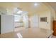 Kitchen features light countertops, white cabinets and a breakfast bar at 2535 Lancaster Dr # 2535, Sun City Center, FL 33573