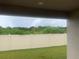 Backyard with fence and grassy area at 12245 Cypress Branch St, Riverview, FL 33579