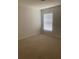 Bright bedroom with neutral walls and carpet flooring at 12245 Cypress Branch St, Riverview, FL 33579