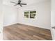 Well-lit bedroom with wood-look floors and window at 3457 22Nd S Ave, St Petersburg, FL 33711