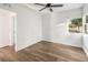 Bright bedroom with wood-look floors and backyard view at 3457 22Nd S Ave, St Petersburg, FL 33711