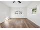 Spacious bedroom featuring wood-look floors and large windows at 3457 22Nd S Ave, St Petersburg, FL 33711